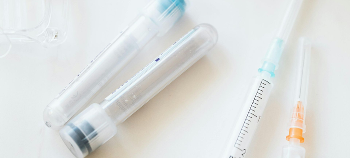 Lab test tubes and syringes